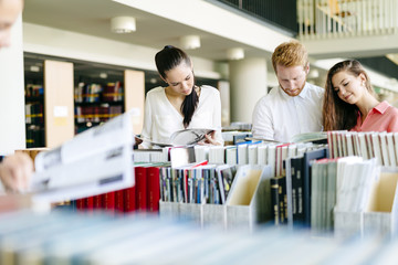 Group of students studying in library