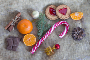 New Year's composition with cane and mandarins