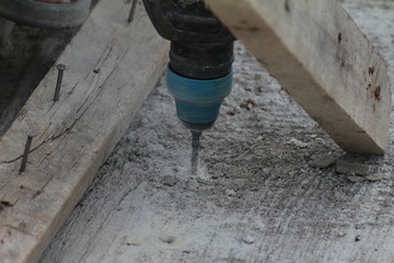 Blue collar work Drill into Concrete , construction