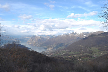 Panoramic image of Valcamonica with Lake Iseo and in the background the snow-capped mountains - Brescia - Italy 04