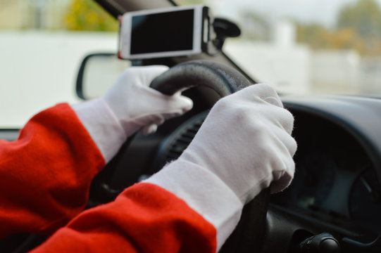 Busy holiday time for Santa Claus driving vehicle carrying delivering presents celebrating joy happiness. Close up on person providing quick transportation service. Rushing people solution concept.