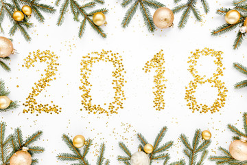 2018 Happy New Year. Gold sequins numbers, gold confetti, balls, design for postcards, banners, posters, website. Flat lay, top view