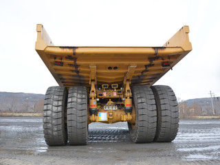 large dump truck body rear view from the side of the body