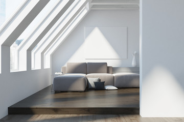 Attic living room, gray sofa, poster, dark