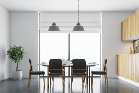 White dining room, black chairs