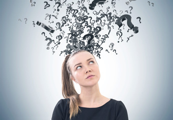 Pensive woman with a ponytail, many questions