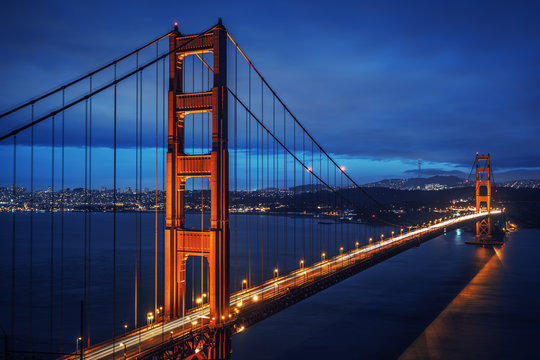 View of famous Golden Gate bridge by night