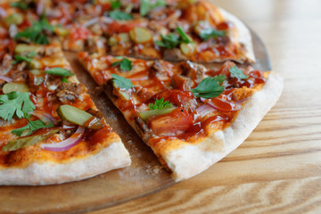 Pizza with meat and barbecue sauce