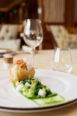 Fish tempura with greens, gourmet dish