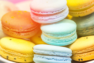 Close up of colorful french dessert macarons on a plate