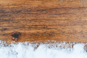 Aged wood texture with snow - background, copy space