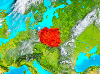 Fototapeta na wymiar Poland in red on Earth