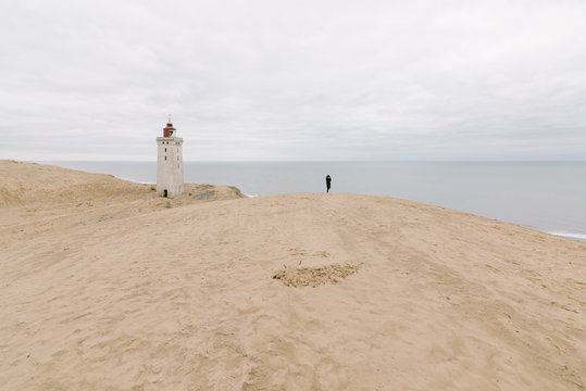 Lighthouse Rubjerg Knude and sand dunes at the danish North Sea coast, Denmark, Europe