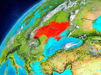 Fototapeta na wymiar Space view of Ukraine in red