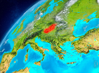 Space view of Hungary in red