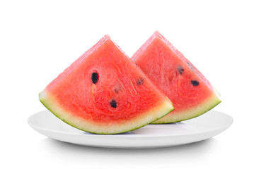 Watermelon slices in white plate on white background