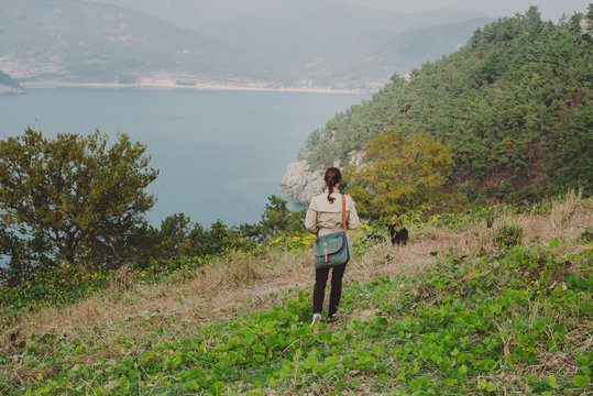 Woman exploring rural countryside in South Korea