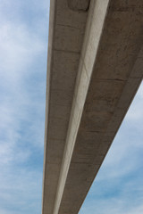 Concrete beam of over walkway bridge with sky background