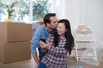 Man kissing to pregnant woman 