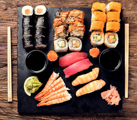 Sushi Set nigiri, sushi rolls and sashimi. © bit24