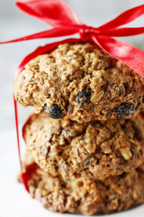 Oatmeal cookies with red ribbon.