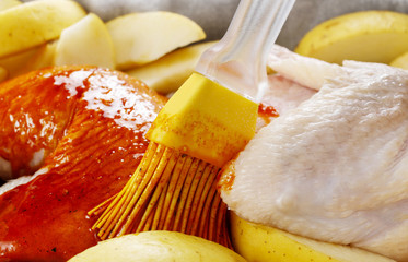 Preparing poultry for baking. Marinated meat.