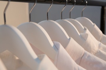 Obraz premium Shirts hanging on cloth hanger