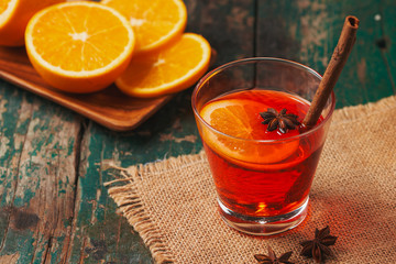 Christmas mulled wine on a rustic wooden table. Holidays concept.