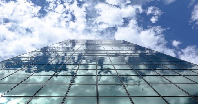 Timelapse of Clouds Reflecting on a Sky Scrapper  