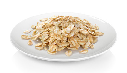 oats in a plate on white background