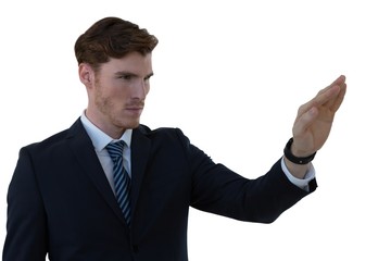 Businessman pretending to use an invisible screen