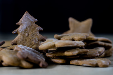 Tasty and delicious gingerbread cookies for Christmas. Christmas treats on the kitchen table.