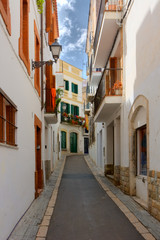 Fototapeta na wymiar Narrow street in Sitges, Spain