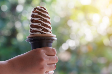 Chocolate ice cream with bokeh background