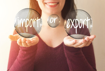 business woman holding transparent bubble with import or export text