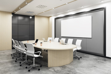 Bright conference room with empty banners