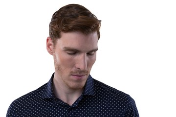 Obraz premium Male executive standing with eyes closed