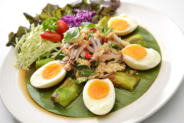 Thai Hot Spicy Salad eggplant and half boiled egg see yolk eat with many vegetable and Chilli