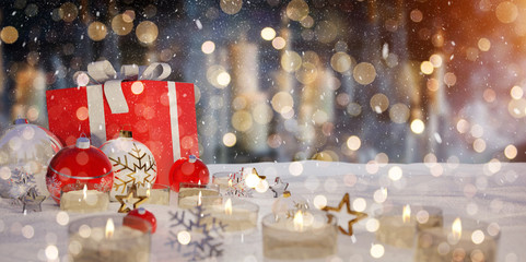 Red and white christmas gifts and baubles on snow 3D rendering