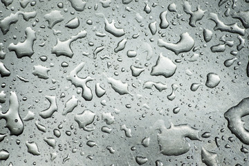 水のかかったステンレスのシンクのアップ