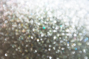 Abstract blurred bokeh of siver grey twinkled glitter use for christmas background.