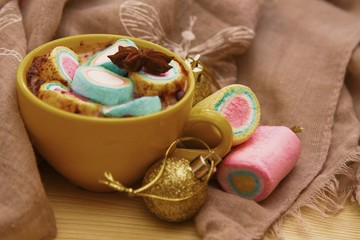 chocolate cup with marshmallows and Christmas decoration