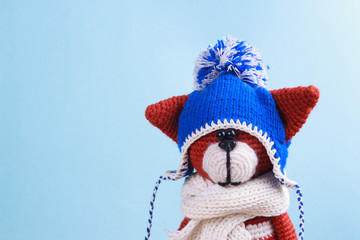 little redcat toy crochet handmade blue background