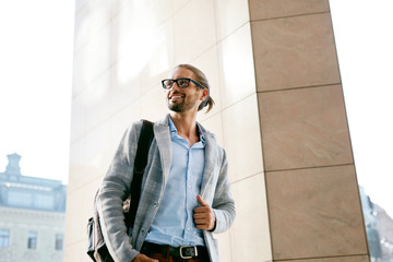 Men Style. Handsome Smiling Man On Street