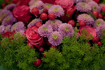 unusual bouquet of roses and chrysanthemums