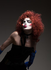 Woman mime with theatrical makeup