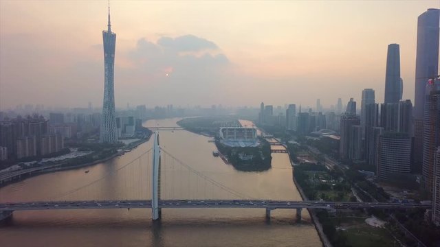 sunset sky guangzhou city canton tower liede bridge river island aerial panorama 4k china
