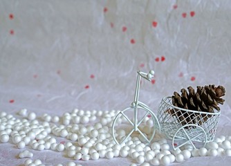 cute wire craft tricycle with pine cone in basket idea for Christmas cute background