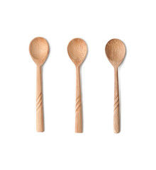 Three teaspoons of natural wood. Isolated on white background..