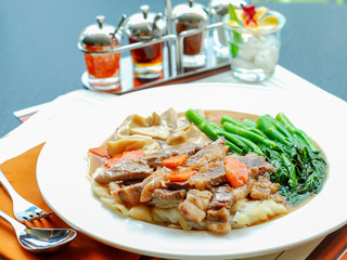 Tasty  noodle in creamy gravy sauce with beef